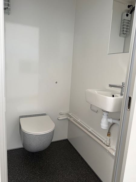 Vacuum toilet med to toiletter